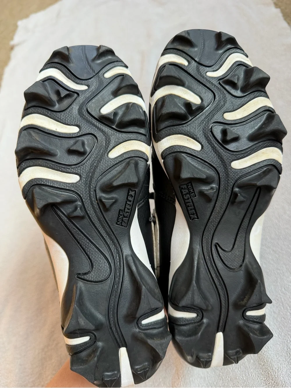 Nike Kids Black and White Baseball Cleats with Swoosh